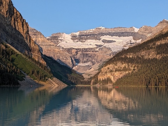 Summer time at lake Louise with majestic water reflection