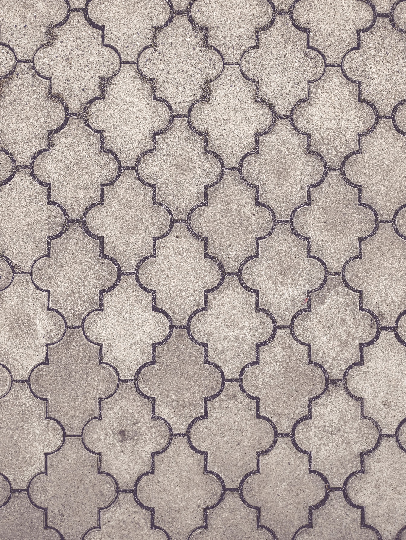 Grey concrete pavement surface texture on ground