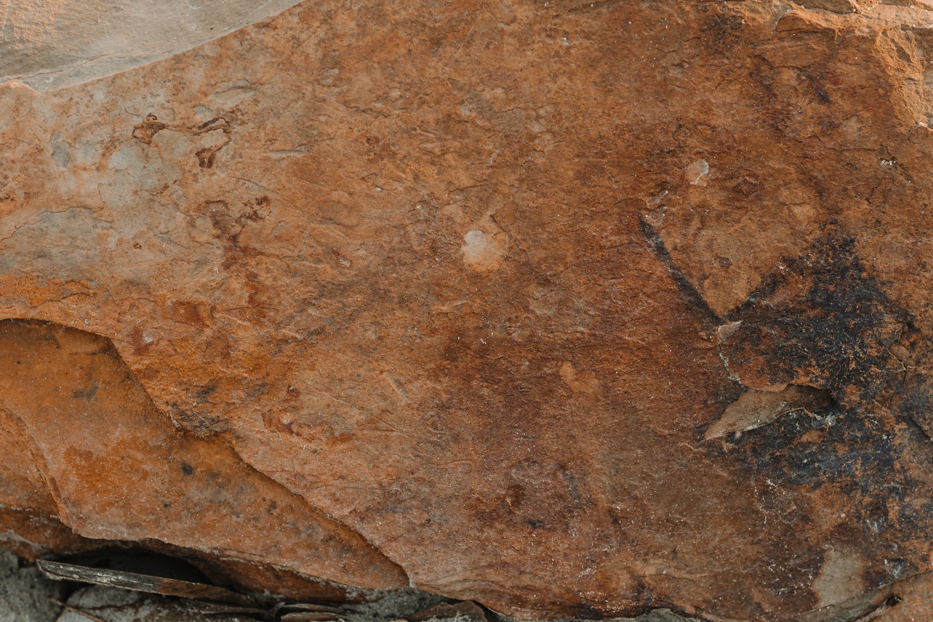 Żółtawo-brązowa tekstura kamienia marmurowego zbliżenie