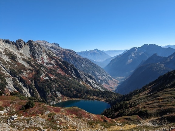 North Cascades lakeside and valley panorama in natural park