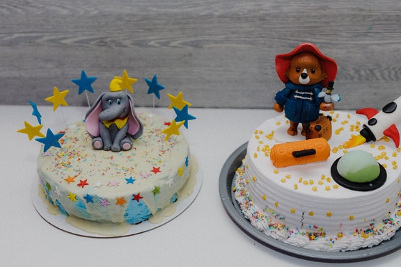 Birthday cake with Paddington teddy bear toy decoration