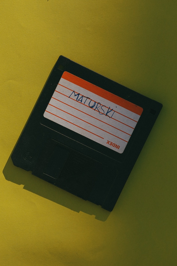Old fashioned floppy disk with label