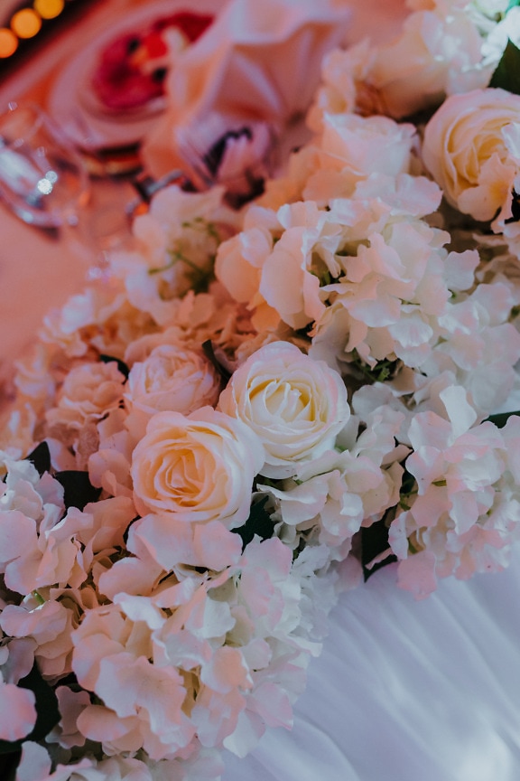 Beautiful white rose buds on wedding bouquet arrangements