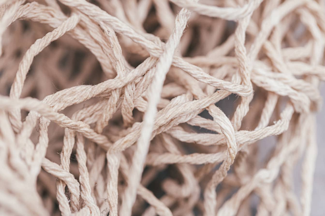 Red de cuerda de hilo blanco con textura de primer plano de nudos
