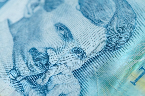 Portrait of Nikola Tesla on banknote on one hundred Serbian dinars