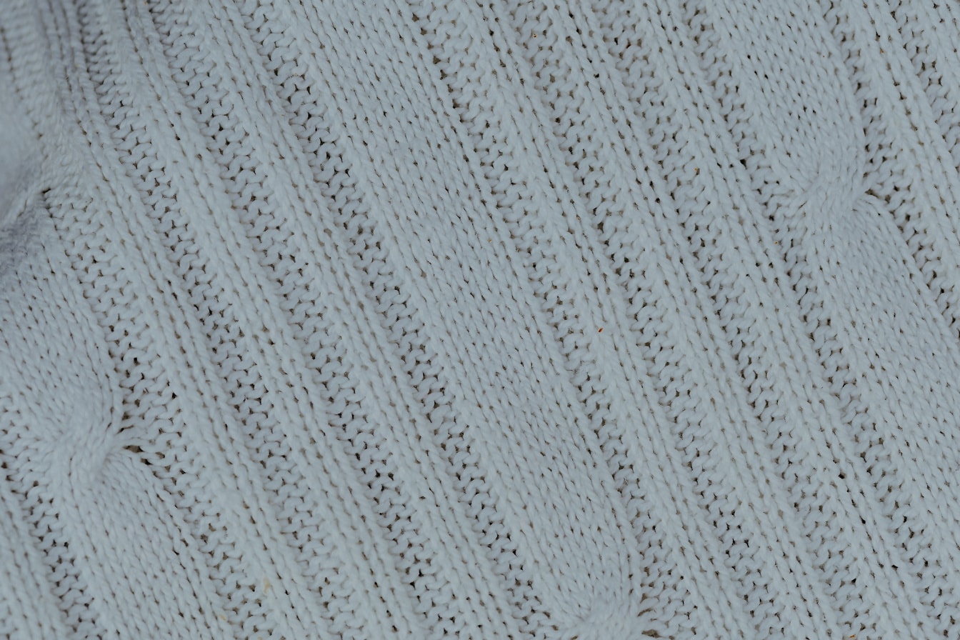 Close up of a white knitted fabric texture