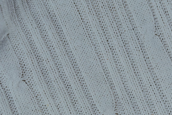 Beyaz örme kumaş dokusunun yakın çekimi