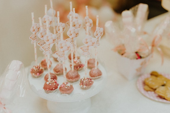 Delicious chocolate lollypops with pretty decoration