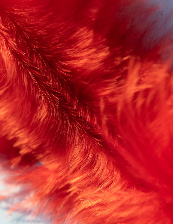 Close up of a artificial red fur texture