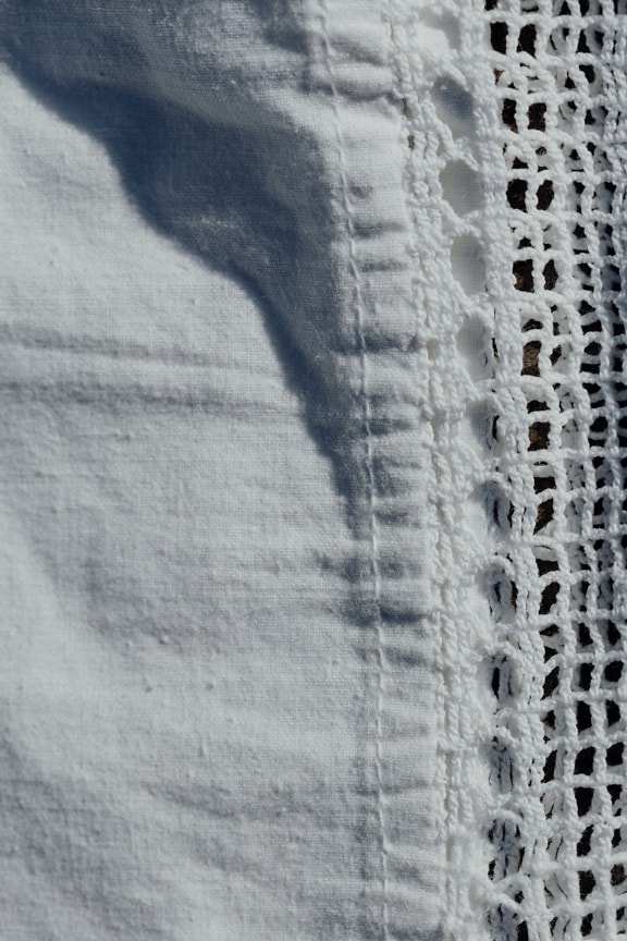 Handmade white cotton handkerchief with lace trim
