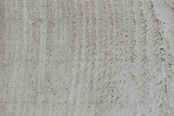 Textura da parede bege suja com marcas de mancha
