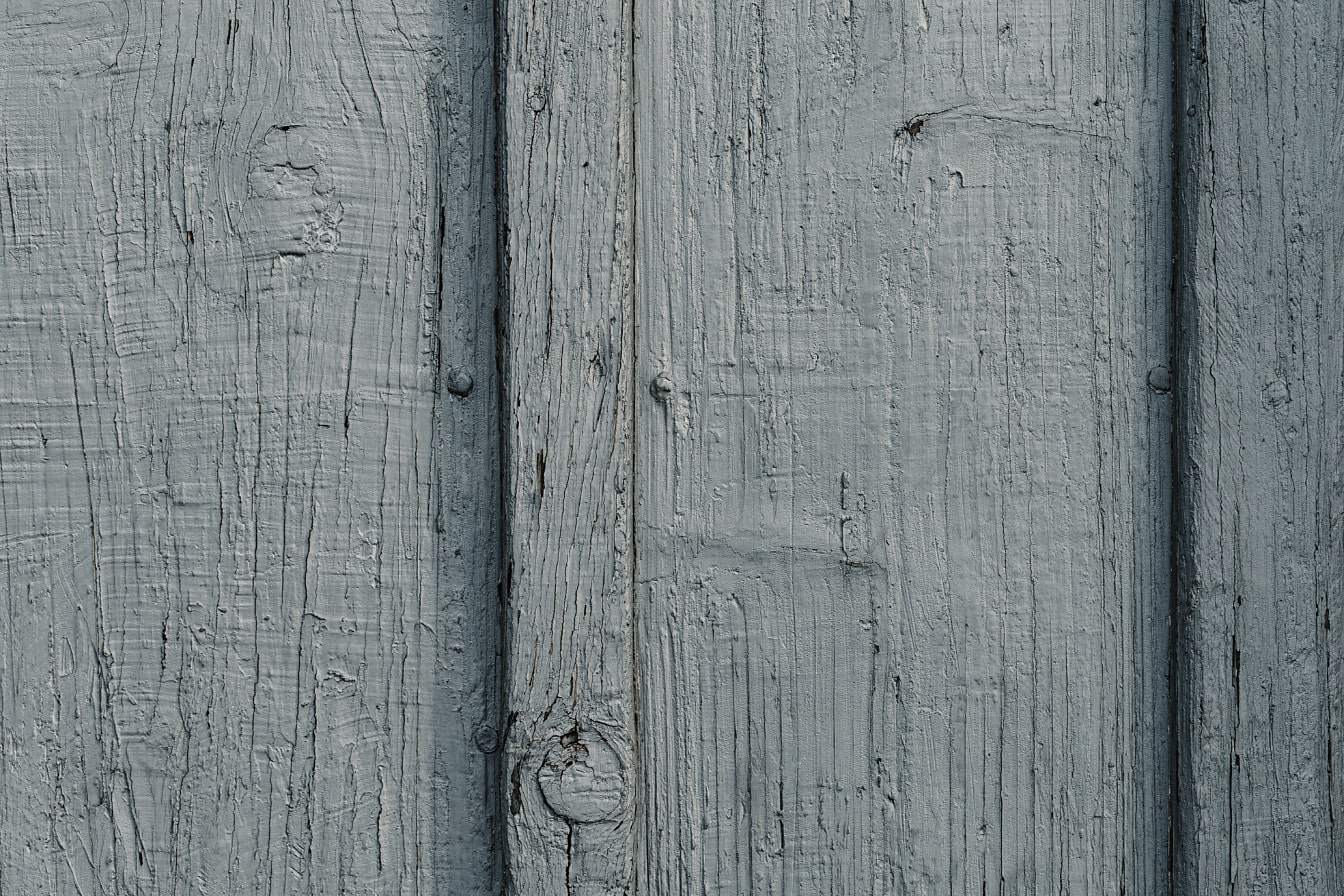 Kết cấu của các tấm ván cũ với bề mặt gồ ghề được sơn màu xám