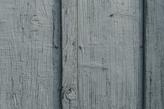 Texture of old planks with rough surface painted in grey paint