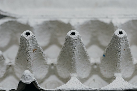 Carton of eggs, close-up of egg box made up of recycled paper