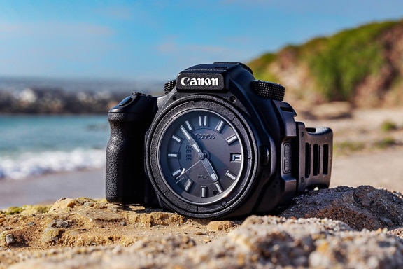 Đồng hồ đeo tay màu đen trong một hình dạng của máy ảnh kỹ thuật số (Canon)
