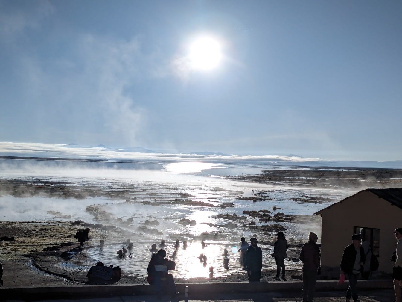 People bathe in a salt lake of hot spring in the Uyuni desert in Bolivia
