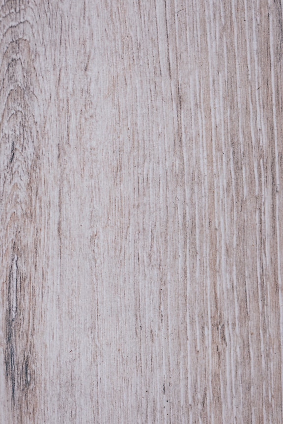 Texture d’une surface artificielle en bois brun clair