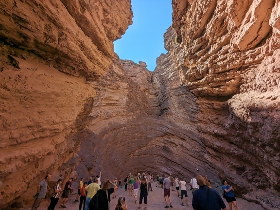 Crowd of people in a canyon at place known as The Amphitheatre in Argentina