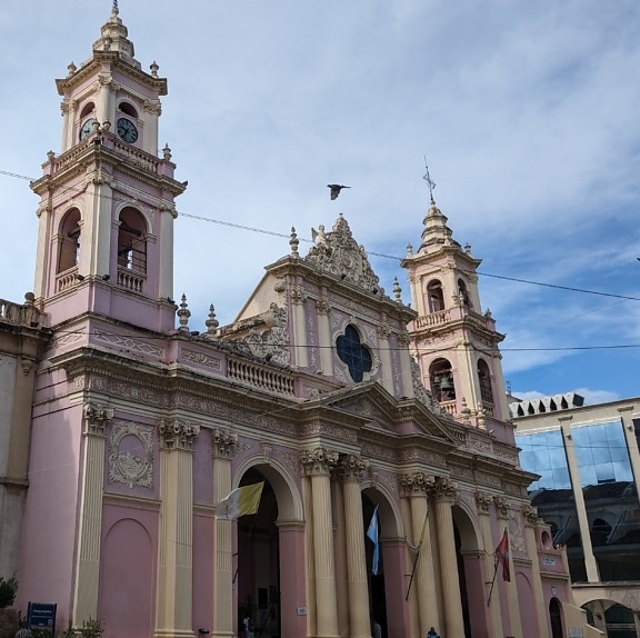 Cathedral Basilica of Salta in Argentina in colonial architectural style with pinkish color on walls