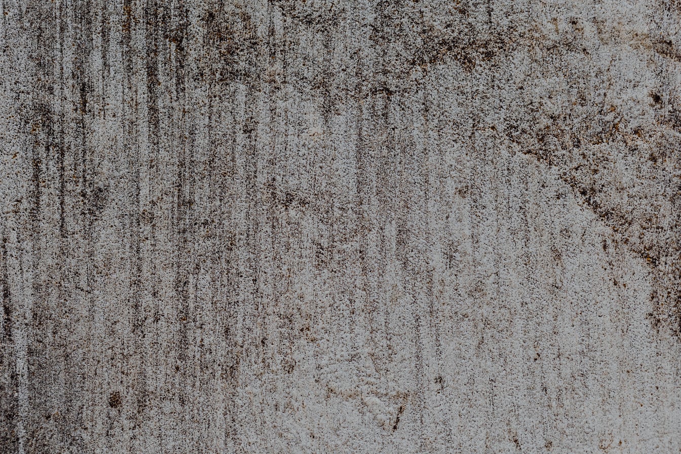 Textuur van een vuile betonnen muur met vlekken