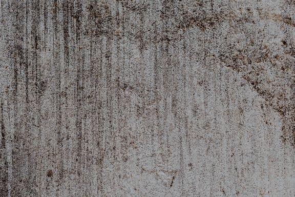 Texture of a dirty concrete wall with stains
