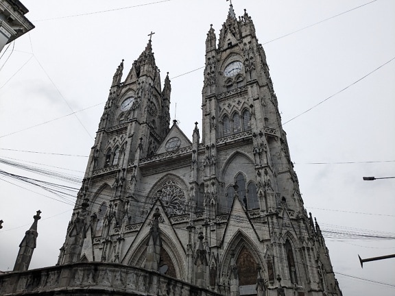 A Roman Catholic neo-Gothic basilica of the National Vow with two clock towers in Quito city in Ecuador