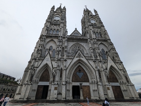 A Roman Catholic neo-Gothic basilica of the National Vow with two clock towers in Ecuador