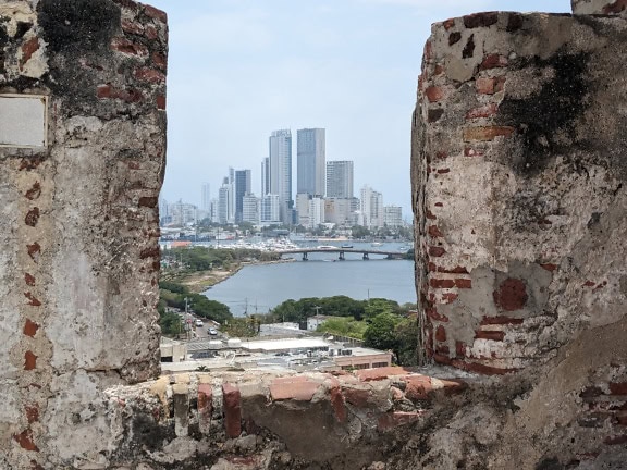 City view from a stone walls at the top of medieval fortress of San Felipe de Barajas in the city of Cartagena in Columbia