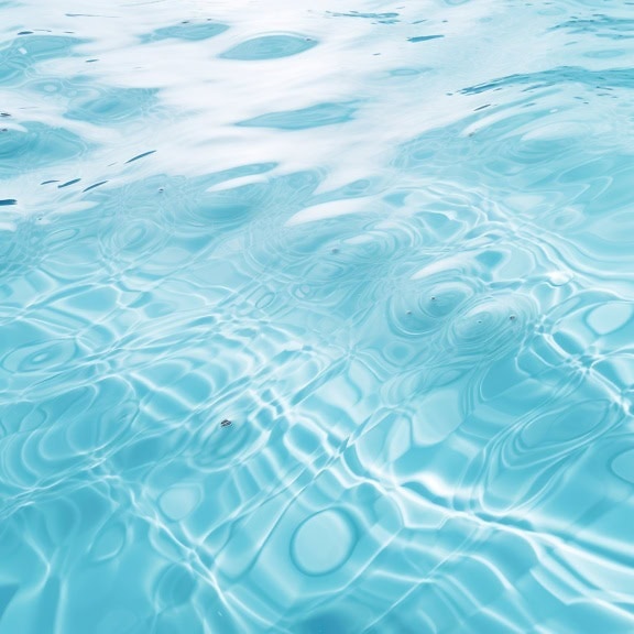 Ripples on transparent turquoise blue water
