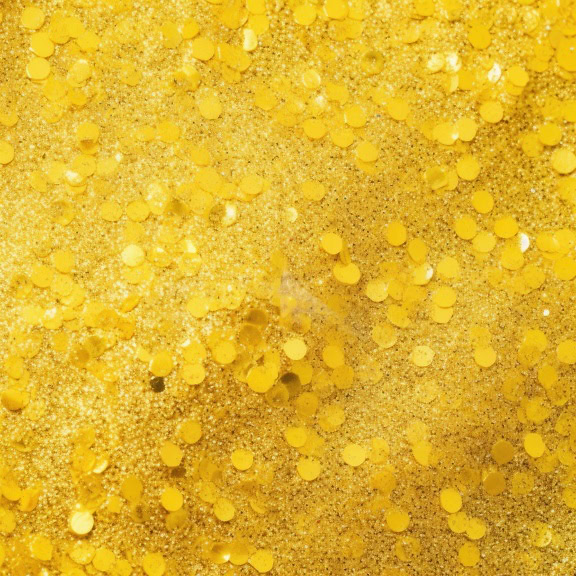 Skinnende tekstur af gult glitter med små runde partikler