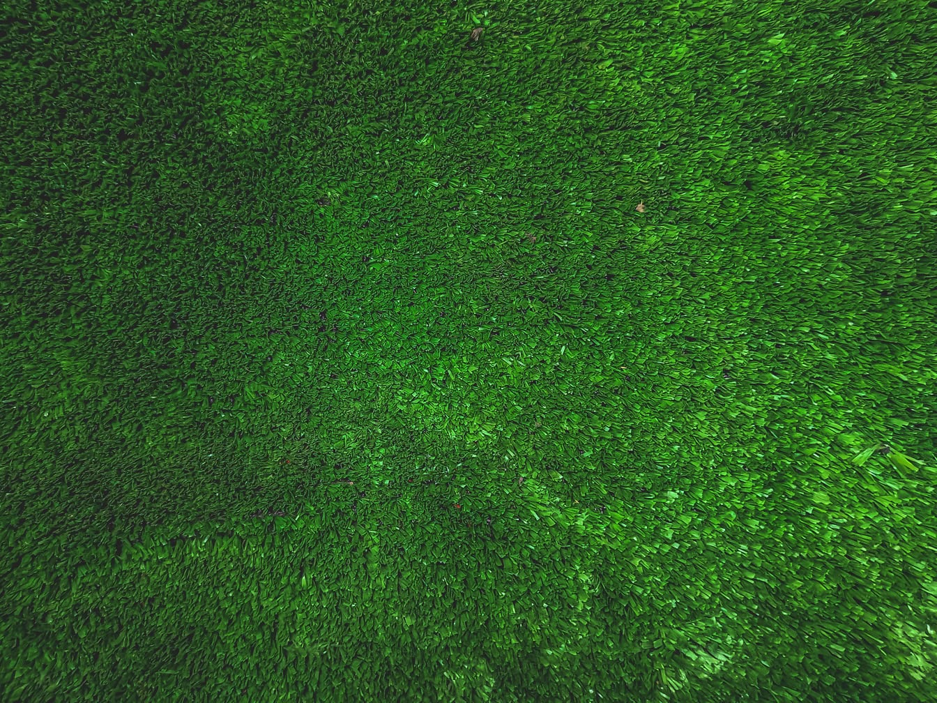 Текстура на изкуствена трева, произведена от синтетичен полимер на пластмаси