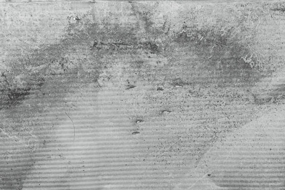 Μονόχρωμη υφή βρώμικης επιφάνειας αλουμινίου με διάτρητες οπές