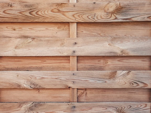 Υφή ξύλινης σανίδας από λεπτές σχάρες σκληρού ξύλου στοιβαγμένες οριζόντια με κόμπους σε σανίδες