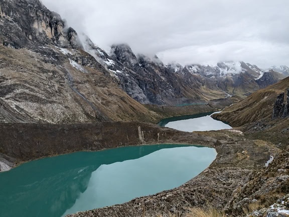Lake Jahuacocha a beautiful glacial lagoon in the Cordillera Huayhuash mountain range at about four thousand meters above sea level