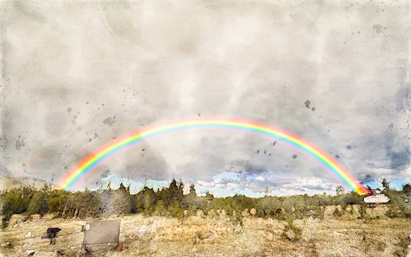 Fotomontagem artística abstrata de uma pintura em aquarela de um arco-íris sobre um campo