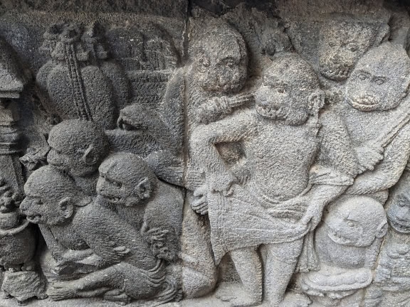 Traditional Indonesian stone reliefs depiction monkeys from Hindu mythology