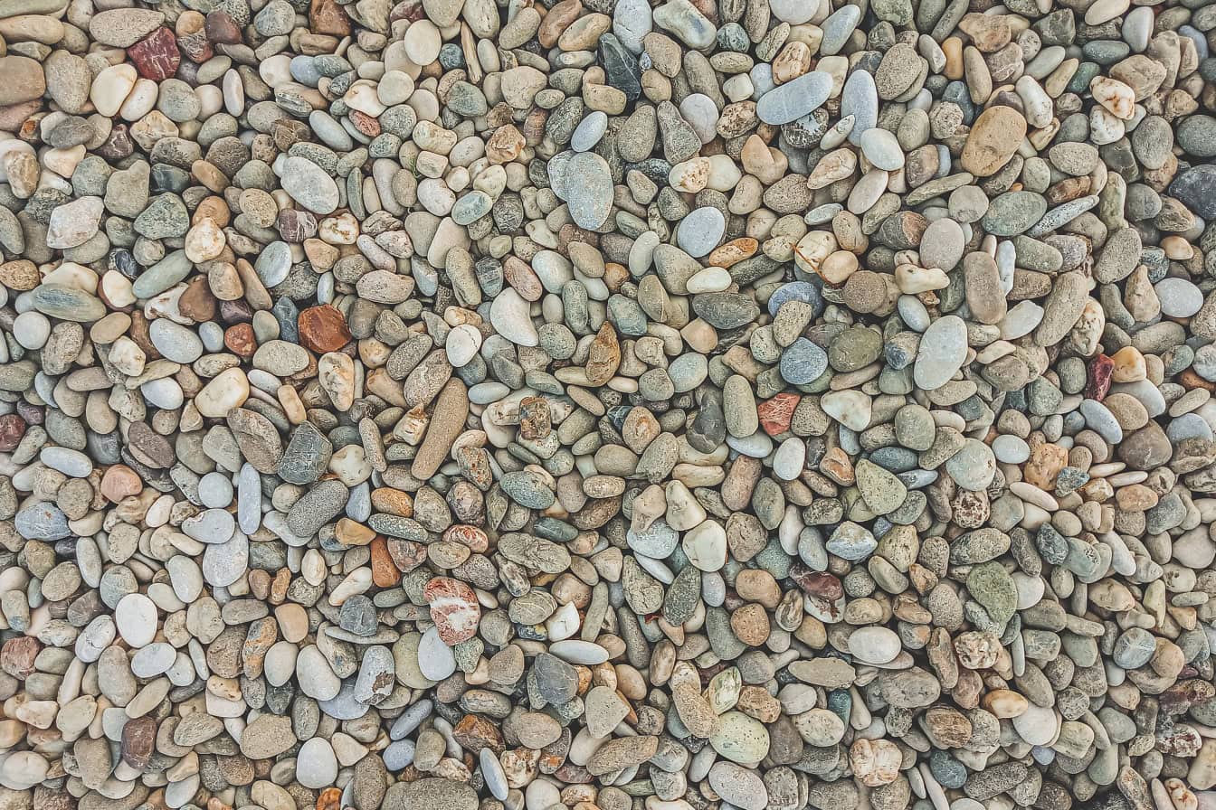 Texture of gravel on the ground, a close-up of pebble stones