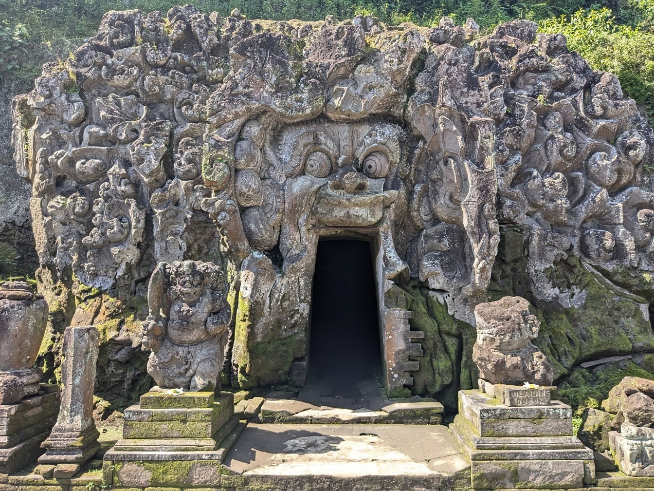 Stone structure with a doorway at Goa Gajah Hindu temple in Bali, Indonesia