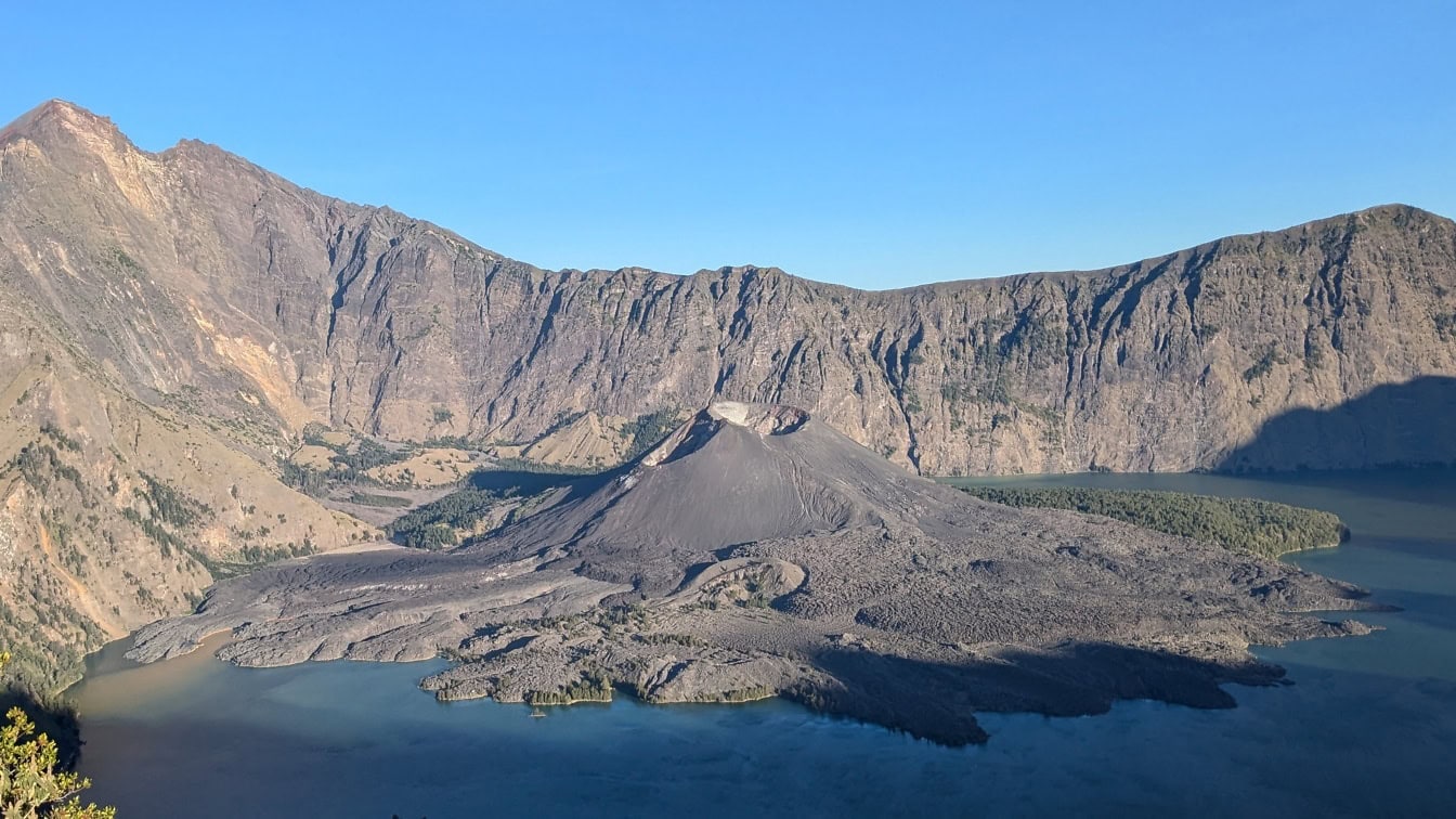 Majestic crater lake in volcanic crater on mountain Rinjani in Lombok in Indonesia