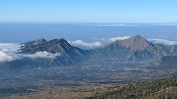 Panoramic landscape of valley and Mount Rinjani in Indonesia