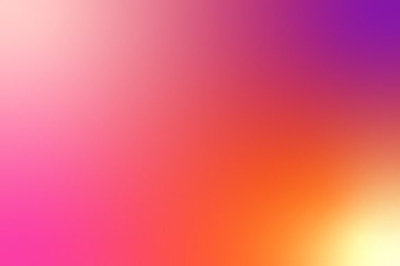 A color gradient, an image with a mix of pink, purple and orange-yellow colors