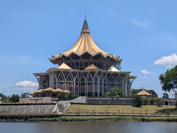 Sarawak State Legislative Assembly building with a pointed roof in Kuching, Malaysia