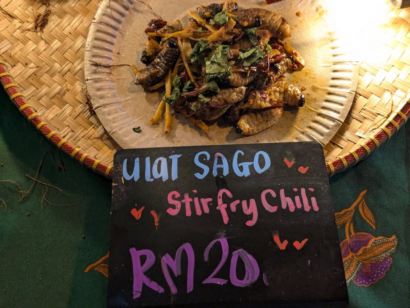 Traditional Malaysian delicacy called the Ulat Sagu, a food made from the larva of the palm weevil (Rhynchophorus ferrugineus)