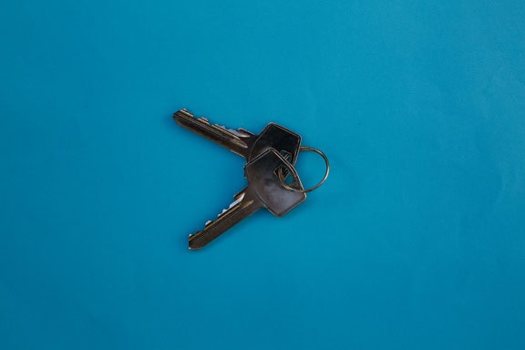 Set of keys on a dark blue surface