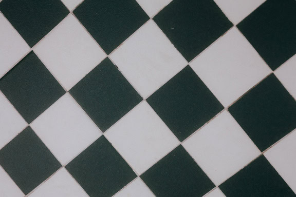 Black and white checkered floor, a monochrome checkered square floor tiles