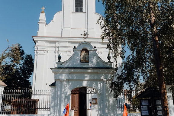 White gateway at the entrance of Serbian Orthodox church of the Nativity of St. John the Baptist, Backa Palanka, Serbia