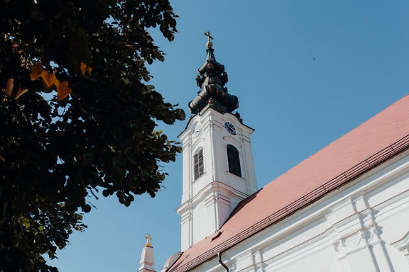 White clock tower of the Serbian Orthodox church of the Nativity of St. John the Baptist, Backa Palanka, Serbia