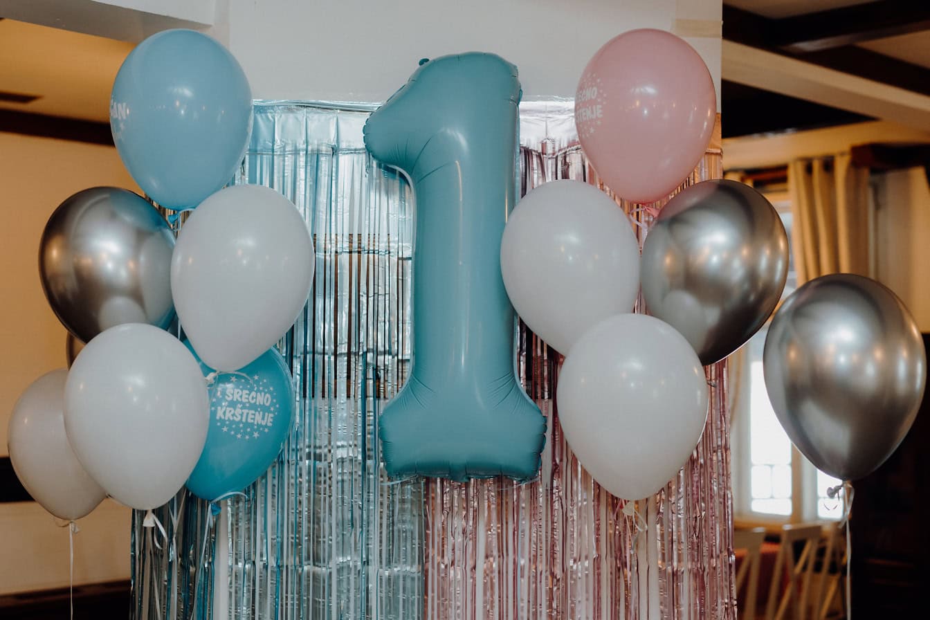 Decorative balloon in the shape of a number one (1), a decoration for celebration of first birthday