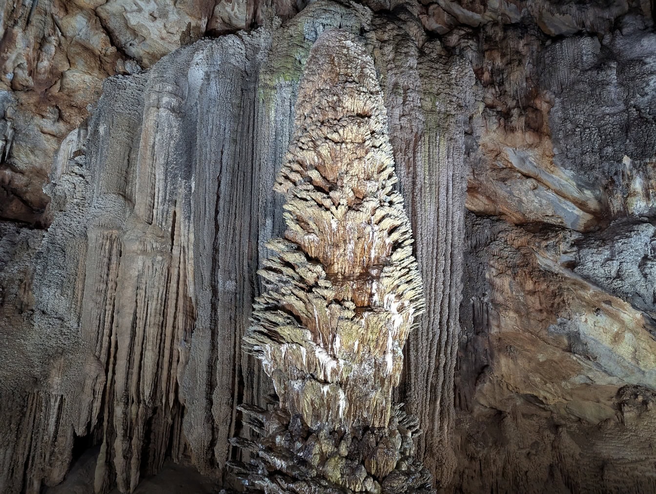 Large rock formation in a underground cave made out of stalagmites, Paradise cave, Vietnam