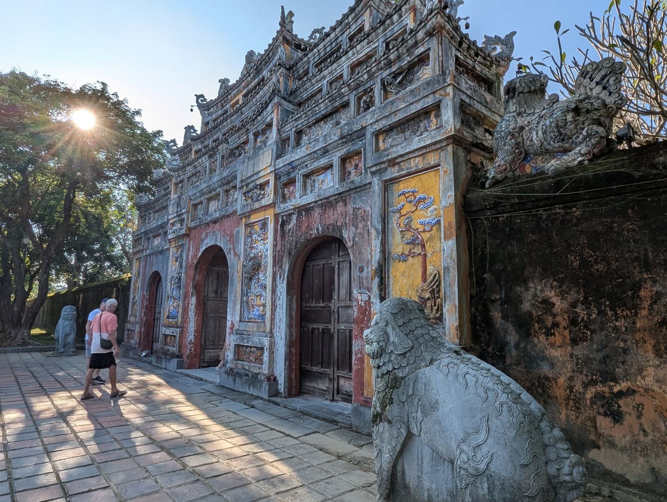 Tourists enter the hidden imperial city of Hue, residential palace of the Nguyen Dynasty 1805 – 1945, Vietnam